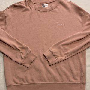 Divided light pink crew neck